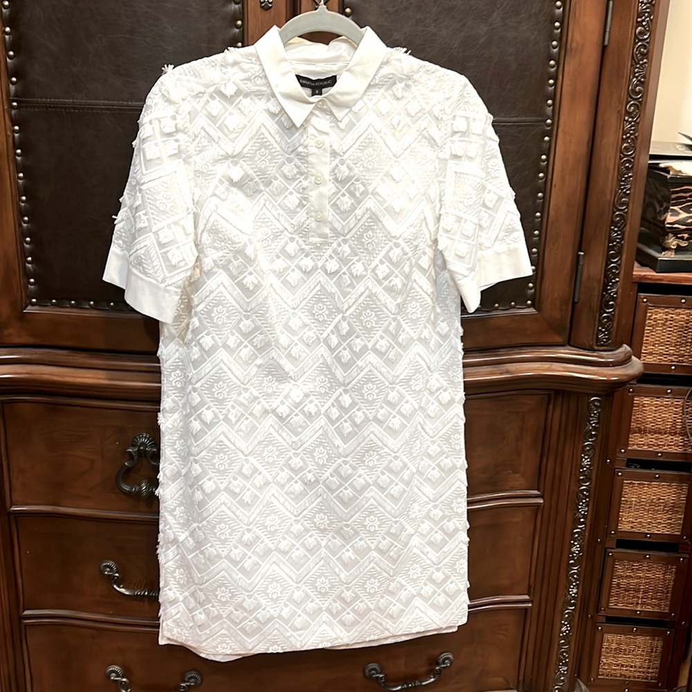 Beautiful new white dress in size small, short sleeve, fringe texture.